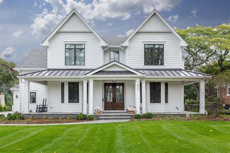 white house black shutters metal roof|white house black and white.